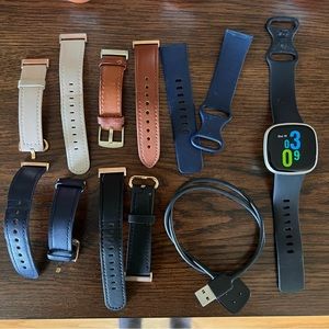 Fitbit Versa 3 with 6 silicone and leather size small straps